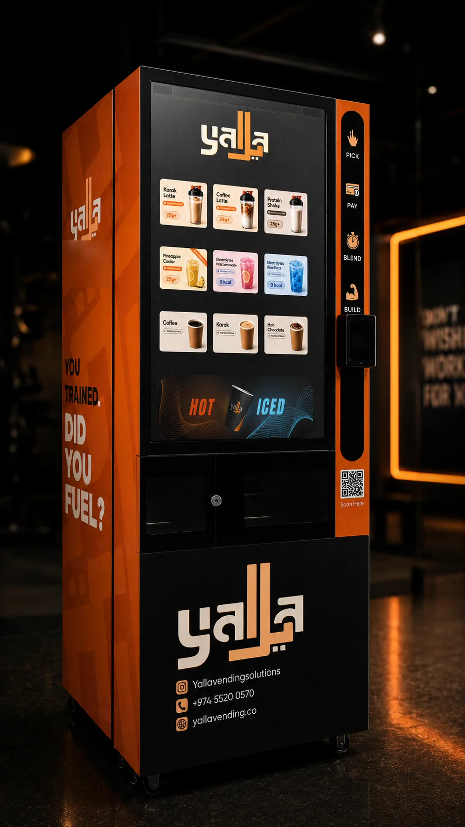 The Yalla machine installed on a gym floor at night, lit by warm orange light